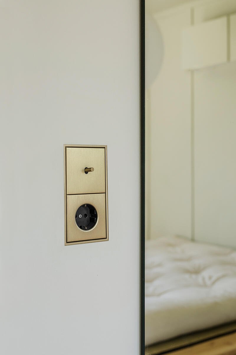 Jung LS 1912 switch and socket brass