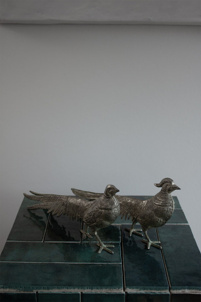set of french silver bird sculpture