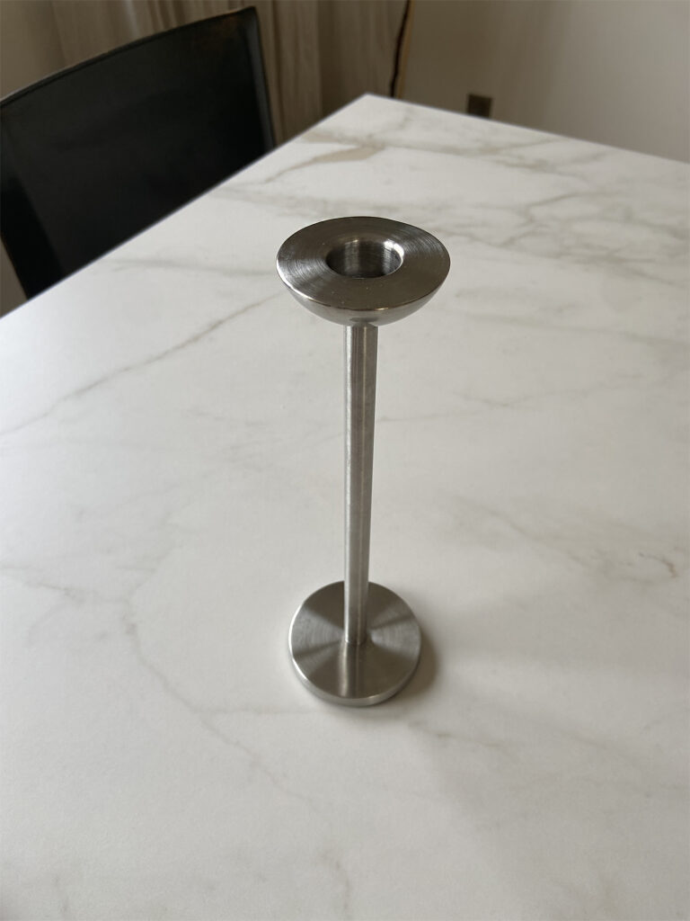 Stainless steel candleholder