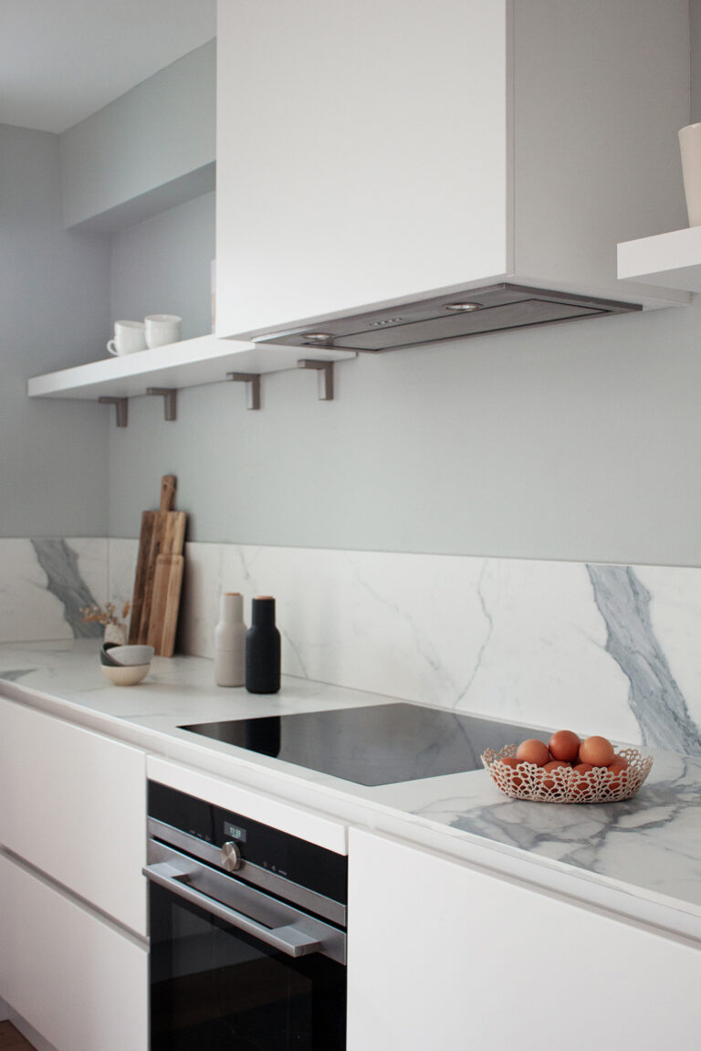 minimal white and blue kitchen